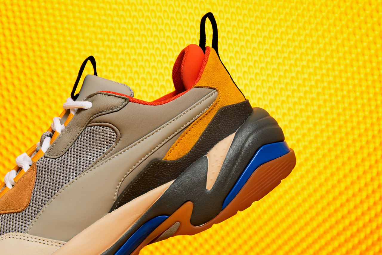 blue and orange puma